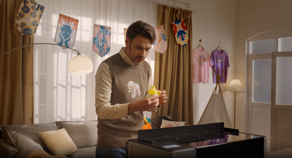 a man cleaning DTF printer head