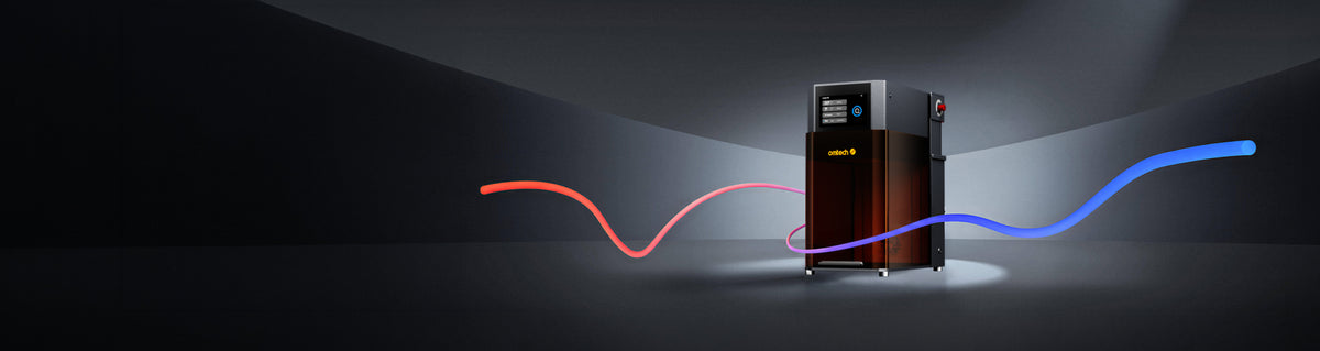 OMTech Solis Duo dual laser engraver with red and blue light trails on a dark background.