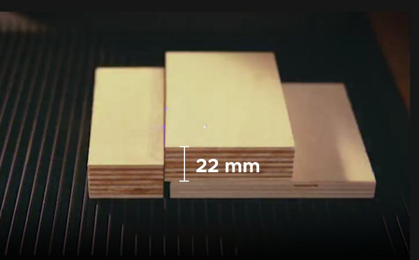 Wood cutting samples with a 22 mm thickness label on the center piece.